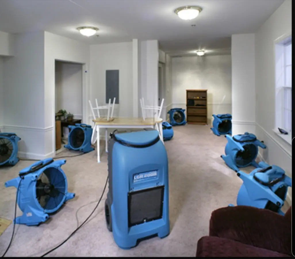 Air movers and dehumidifier setup for Water Damage Restoration in Jan Phyl Village